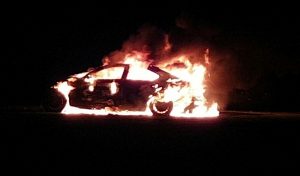 Casey’s night sky lit up by car fires