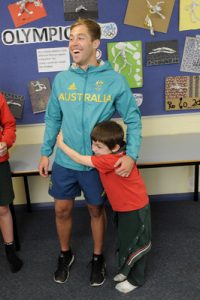 Olympian touches base with alma mater