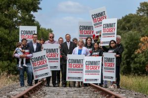Casey campaigns on roads, rail