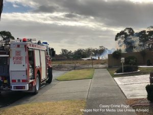 Crews battle grass fire