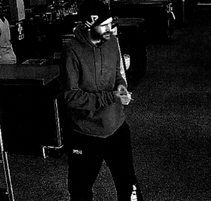 Camera clue for cop hunt