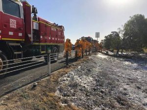 Crews battle grass fire