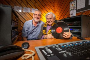 Tommy hangs up the mic