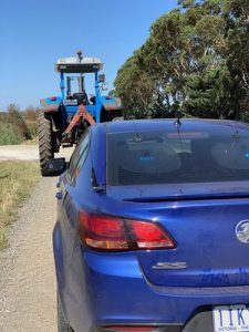 Tractor driver nabbed using mobile phone