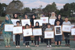 Communities come together for candlelight vigil