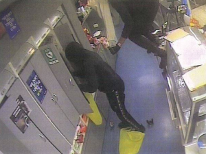 Car smashes through front doors