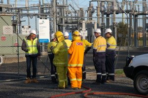 Crane flips, causing power black out