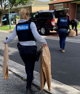Weapons and cash seized in raid