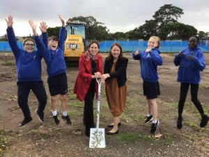 Kids turn sod on school upgrades