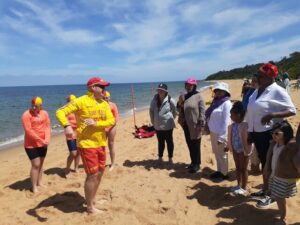 Between the flags: new-arrivals get tips on water-safety